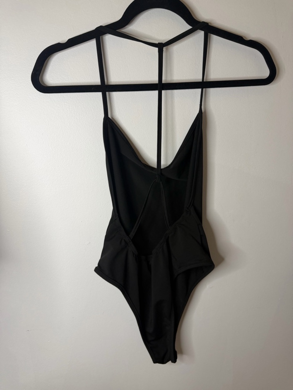 Black Strappy One-Piece Bodysuit